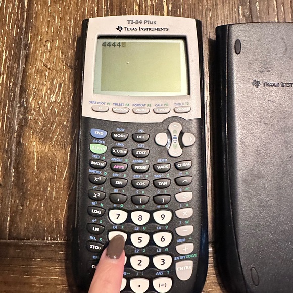 Texas Instruments TI-84 graphing calculator in black - Picture 2 of 3